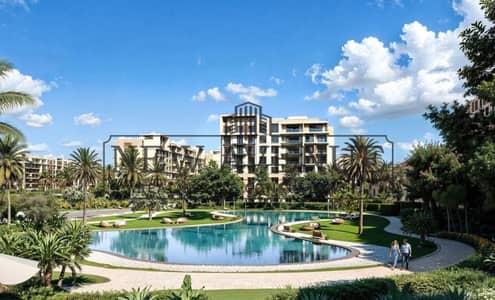 شقه متشطبه بالكامل علي اطلاله خضراء في سيتي جيت بمقدم و اقساط لشركة ديار القطرية - City Gate -  New Cairo