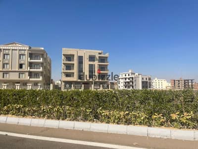 Land for sale: Corner plot facing a park (North-facing) in Beit Al-Watan, Fifth Settlement, New Cairo.