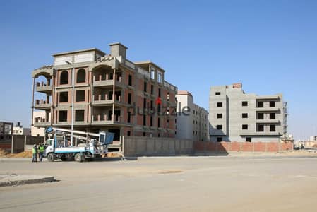 Land for sale: East-facing, second plot from the "View Zone" in the 8th District (Beit Al-Watan), Fifth Settlement, New Cairo.