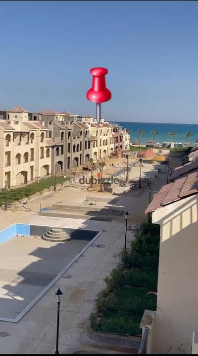 For sale: A 100-square-meter chalet with a 100-square-meter roof terrace, located directly on the seafront at Lasirena Palm Beach.