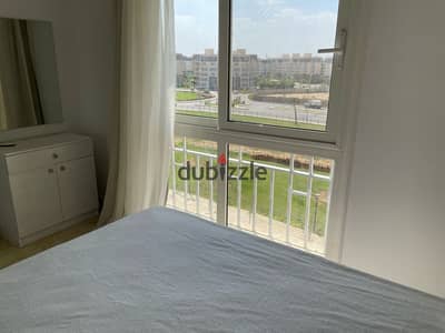 140-square-meter furnished apartment for rent in Madinaty; garden view, located next to amenities.