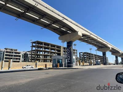 Land for sale, a clear corner plot of 32m on a divider in the New Cairo, Fifth Settlement