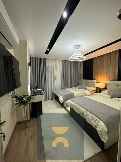 2 bedroom apartment with panoramic landscape views 50% discount 12 year payment plan on El Amal Axis and Suez Road in Mostakbal City near Madinaty