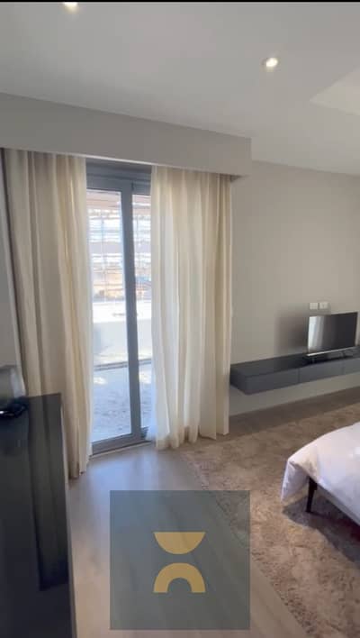 Apartment for sale in installments for 12 y a location on Center Park with  50% discount on amal Axis next to Madinaty and Mountain View in Sarai
