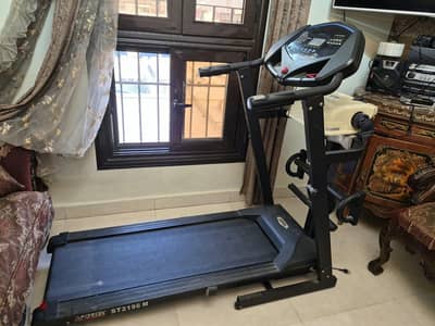 مشاية كهربائية  SPORTEC ST2196 M بحالة الممتازة + حزام تخسيس كسر زيرو