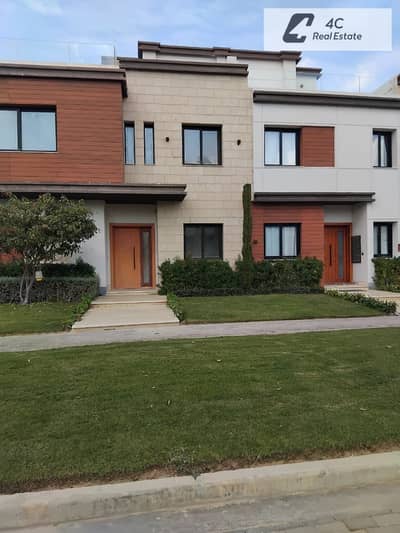 Own a townhouse with a 10% down payment and interest-free installments in Azar Infinity Compound, Fifth Settlement, featuring a distinctive layout