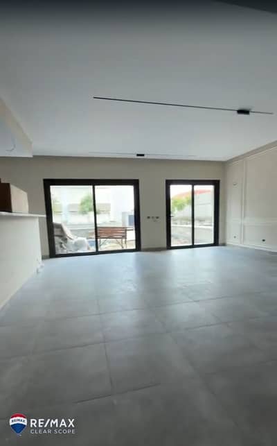 Smart duplex with garden and private swimming pool for sale in Trio Gardens, Fifth Settlement; finished super-luxury owner-standard.