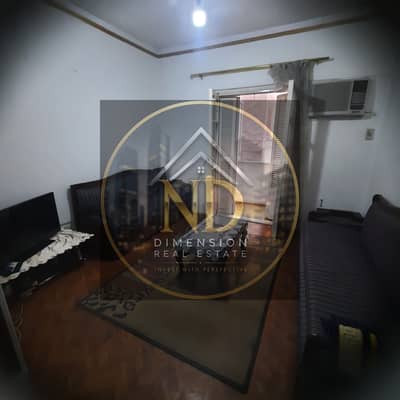 An opportunity for medical students: a furnished two-bedroom apartment near Al-Basht Square at a bargain price.