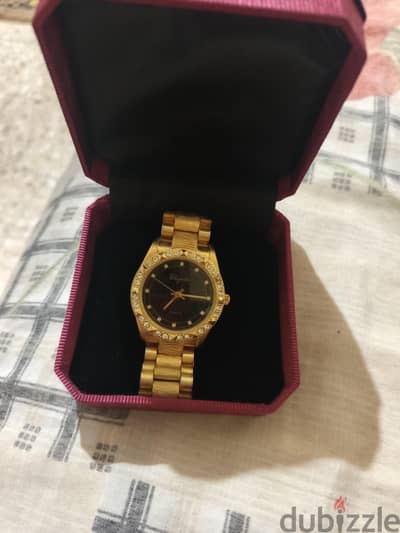 ساعة حريمي Elegante Quartz دهبي بفصوص - بالعلبة - استعمال خفيف