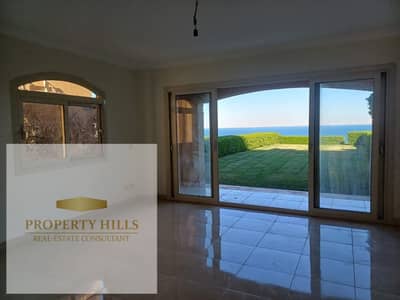 Two-bedroom chalet in Telal El Sokhna, fully finished with a direct sea view, for sale at half price with a low down payment and installments up to 10 years interest-free.