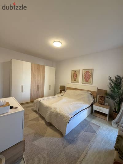 Two-bedroom apartment with two bathrooms, cash view, and garden in one of Madinaty's prime locations – B6 Green Spaces
