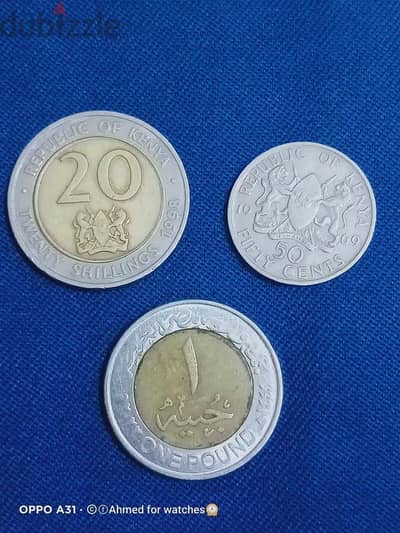 عملتين  دولة  كينيا 5سنت سنة 1969 و20 شلن سنة 1998