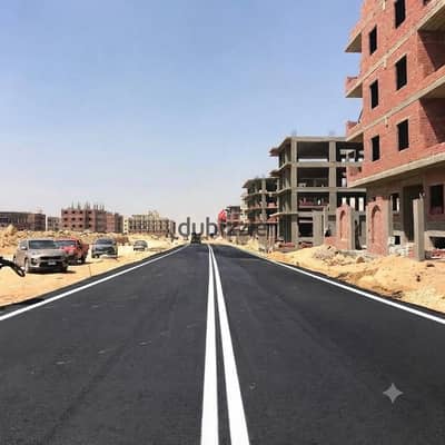 Land for sale in the 6th District – very close to Bin Zayed Axis – Beit Al-Watan – Fifth Settlement.