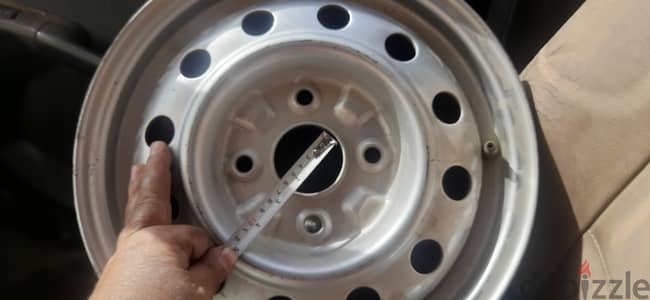 جنط اصلى  واحد فقط  جديد لم يستخدم مقاس 14والابعاد موجدة بالصور