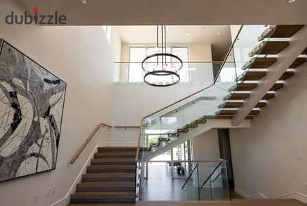 Villa for sale in New Sheikh Zayed, Pool 11, 250 square meters, genius location next to Girona, with a 10% down payment and equal installments