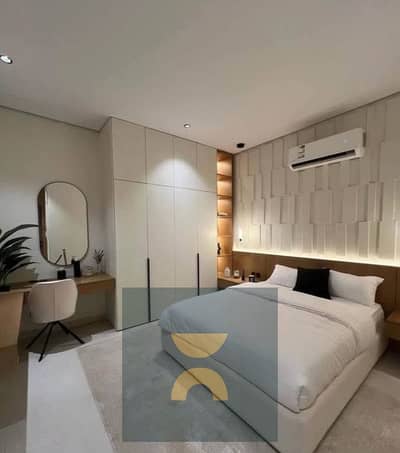 Apartment with an open pool view for sale installments over 12 years on the Suez Road next to The Spine Towers AUC Fifth Settlement Hyde Park Mivida