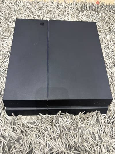 PS 4 with 2 controllers excellent condition