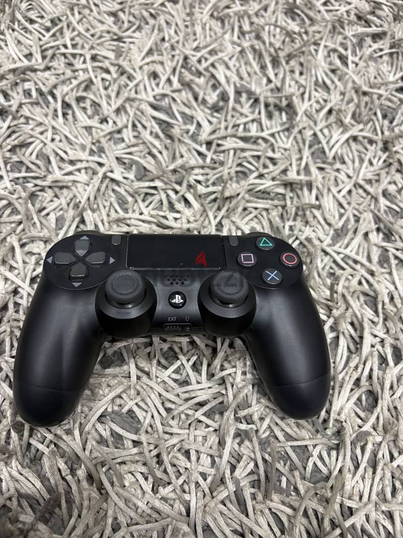 PS 4 with 2 controllers excellent condition 1