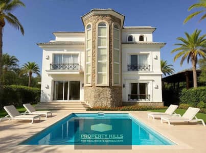 Furnished villa with a swimming pool in Mountain View prime location in a compound that has all services next to AUC and Patio 3 and The Waterway and Zizinia and Hayah Residence and Grand Residence