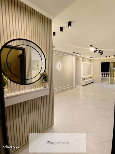 For sale in Al-Ahram Gardens, an apartment with a meter and an elevator, hotel-style finishing, the building is on the wall.