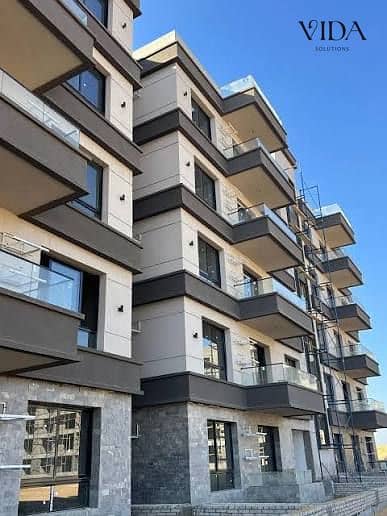135m² apartment for sale in Dejoya New Zayed, facing Sphinx Airport; 5% down payment and a 10-year installment plan.