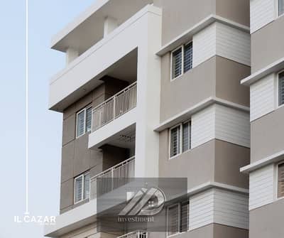 Ready to Move Apartment Luxury Finishing  Directly in Front of the Airport, Minutes from Nasr City & Heliopolis. 10% Down Payment 10 Year Installme