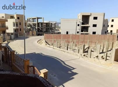 Land 562 SQM Behind Mall of Egypt – Building License and Additional Floor Permit for Sale in Palm Villa