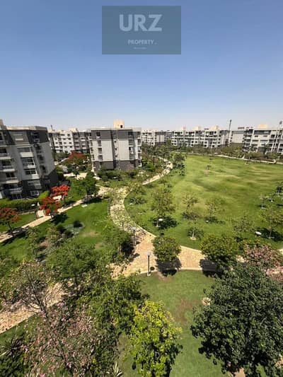 Apartment for sale open view on Central Park directly next to Madinaty and directly on the Suez Road minutes from the Fifth Settlement