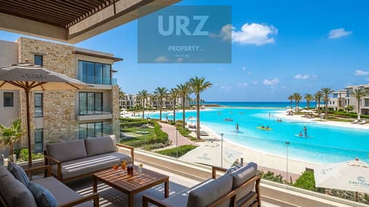 own a two-bedroom chalet with the highest rental yield first row on Crystal Lagoon minutes from John Sodic Salt Summer modon Ramla