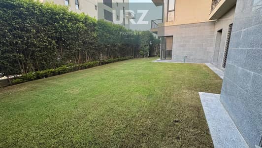 Next to Clubhouse live in a ground floor apartment with a garden for sale on the Suez Road near Madinaty and Al-Gar Al-Shorouk minutes from Swan Lake