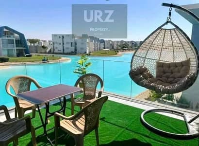 own a two-bedroom chalet with the highest rental yield first row on Crystal Lagoon minutes from Jun Sodic Salt Summer modon Ramla