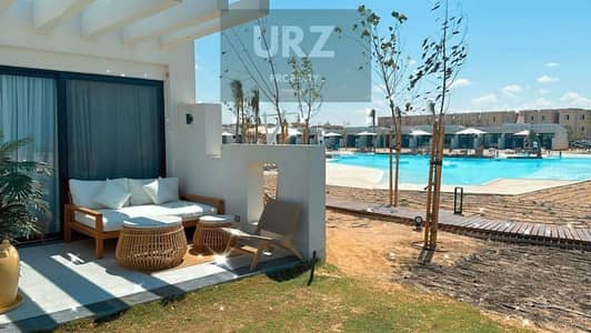In the best location on the North Coast a fully finished two-bedroom chalet next to Modon and Waterway near Dee Bay and Summer Cali Coast Ras El Hekma