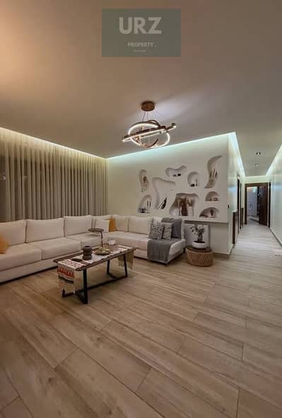 Apartment for sale with the lowest down payment in Market Direct on the Suez Road and opposite Cairo Airport, near Al Rehab Taj City Compound