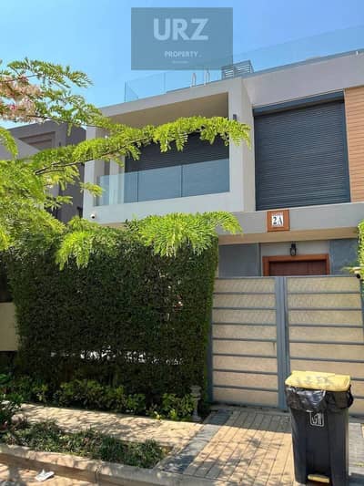 For sale at half price a 4-bedroom villa with a private pool in the best location in New Cairo on the Suez Road next to Madinaty and near Sodic Mivida