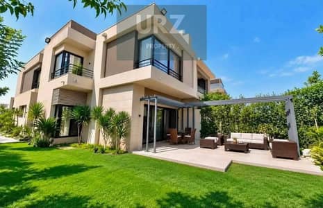 For sale at half price a 4-bedroom villa with a private pool in the best location in New Cairo on the Suez Road next to Madinaty and near Sodic Mivida