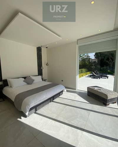 Standalone villa for sale in installments over 10 years with a private pool and 50% on the Suez Road next to SODIC in front of Madinaty