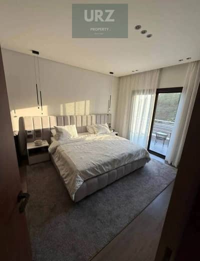 For sale 12 year villa 5 bedrooms with a distinctive garden view in Butterfly on the Suez Road near Mountain View and SODIC.