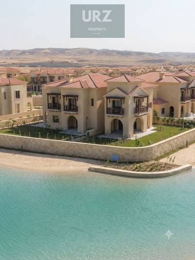 فيلا تاون هاوس 5 غرف كورنر علي lake للبيع في المستقبل سيتي علي طريق السويس بومحور الامل بجوار مدينتي في ذا بترفلاي بجوار من سوديك و تالدا وسيتزين