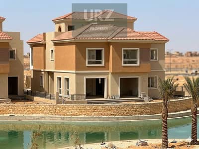 Luxury 5-bedroom villa in Sarai with panoramic lake views, 8-year installments or 50% instant cash discount, minutes from AUC, Madinaty & Bloomfields