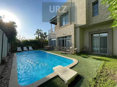 Fully finished townhouse with pool and installments over 10 years without interest next to SODIC on the Suez Road directly
