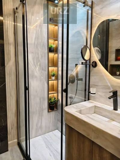 Fully finished apartment with 15-year installments or a 64% discount Prime location beside Sodic East on Suez Road near Al Burouj La Vista El Shoro