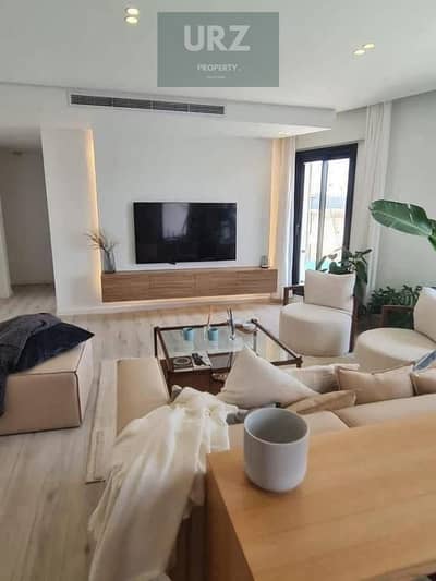 Fully finished lagoon-view apartment with easy installments on Suez Road opposite Madinaty Gate 3 near Sarai and Patio Sola