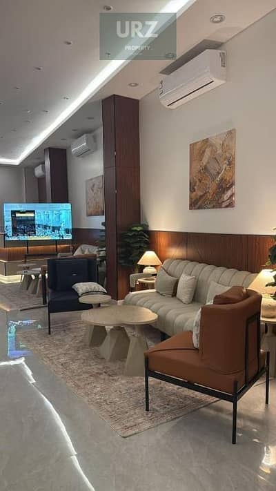 125 sqm fully finished apartment with lagoon view, ideal for investment, directly on Suez Road near La Vista, Al Burouj, and opposite Sarai.