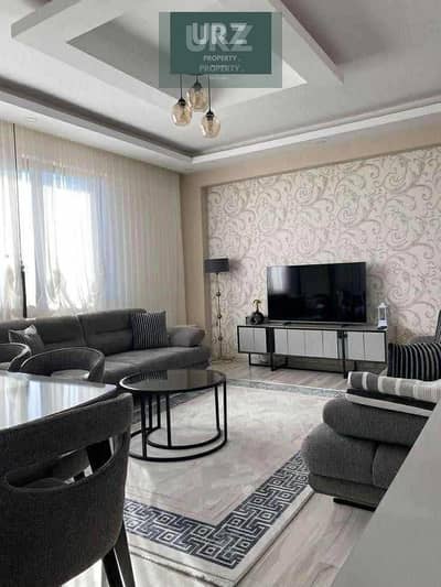 Luxury apartment with panoramic views in The Butterfly Future City 50% discount 12year installments directly on Suez Road near SODIC Madinaty