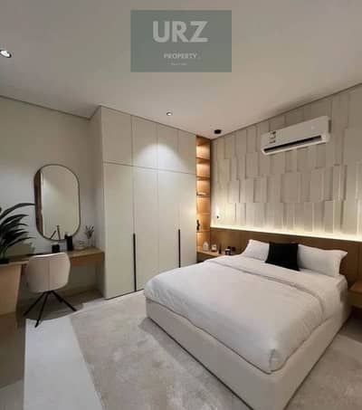 Apartment with an open pool view for sale installments over 12 years on the Suez Road next to The Spine Towers AUC Fifth Settlement Hyde Park Mivida