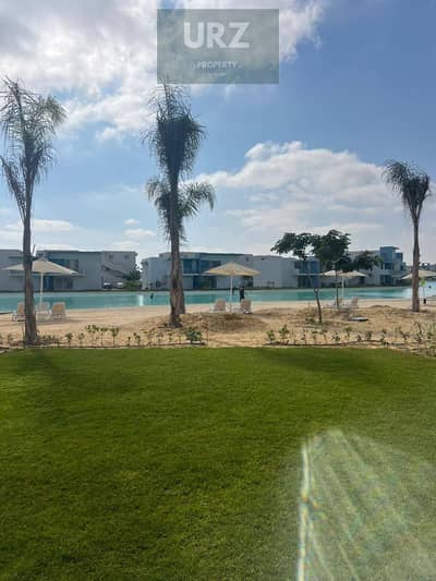 With the lowest down payment in Marsa Baghosh a ground floor chalet with a private garden full sea view fully finished next to Ramla cali Coast dose