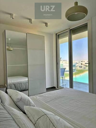 First row on Crystal Lagoon fully finished chalet for sale with air conditioning in Ras El Hekma next to Modon and near Hacienda and Hyde Park