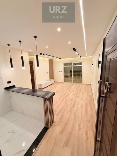3-bedroom apartment for sale at half price on the Suez Road minutes from Fifth Settlement and Madinaty near Mountain View iCity