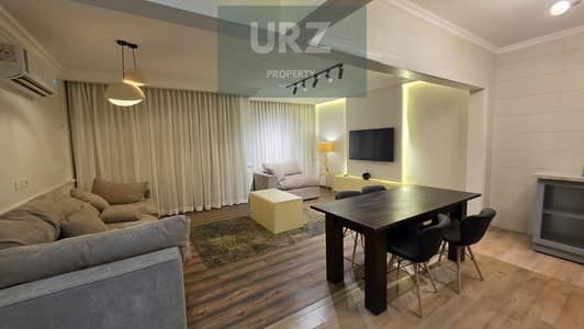 2-bedroom apartment for sale in Center Park, New Cairo. Installments up to 12 years or 50% cash discount. Prime location on Suez Road near AUC