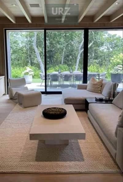For sale 12 year villa 5 bedrooms with a distinctive garden view in Butterfly on the Suez Road near Mountain View and SODIC.